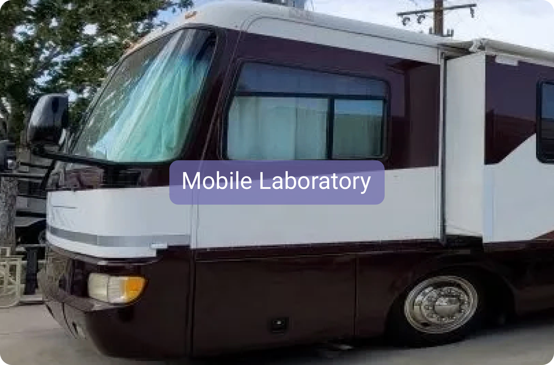 Mobile laboratory vehicle parked outdoors.